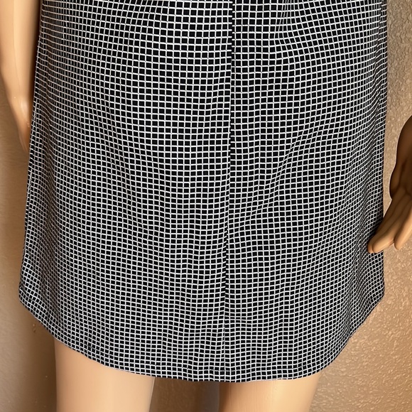 BCBGENERATION Black & White Checkered
Sheath Dress with Sheer V Neck Size XS - Picture 9 of 12